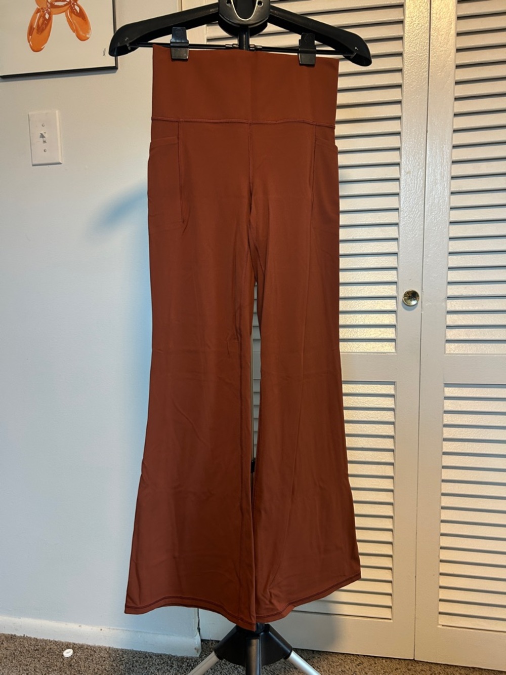 Athleta Salutation Stash High-Waist Flare Pants in Burnt Orange